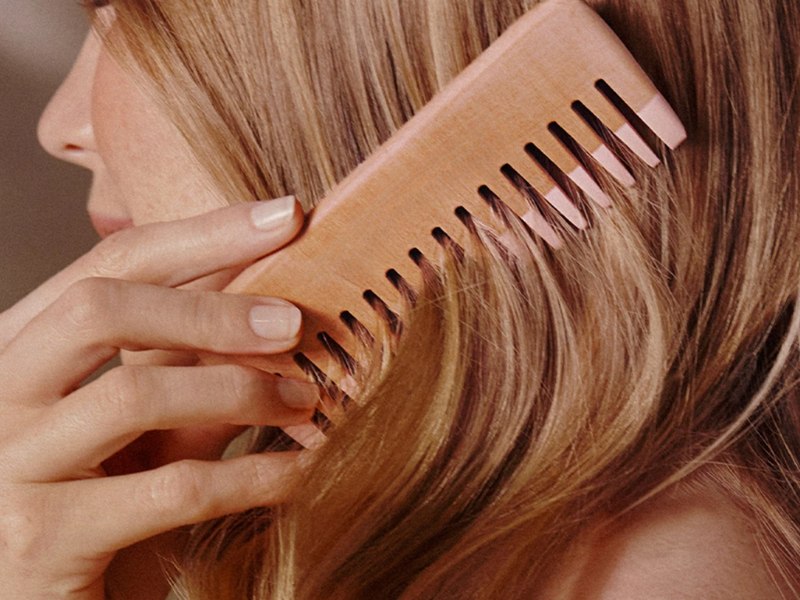 Use a wide-tooth comb or your fingers to gently detangle your hair