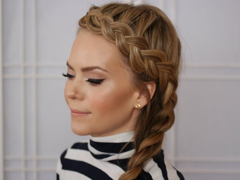 A soft and voluminous Dutch braid headband makes this style stand out