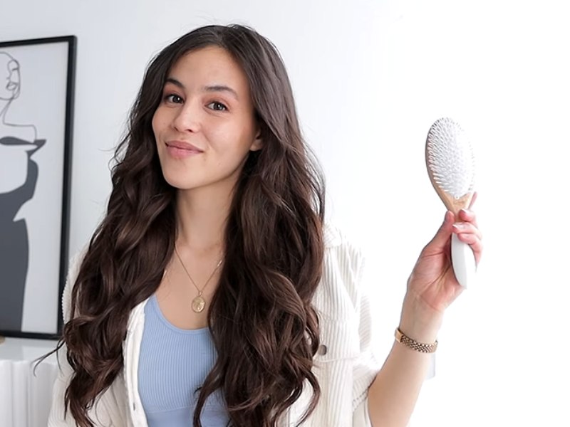 Use a brush or your fingers to blend with hair extensions