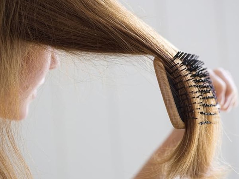 Use a wide-tooth comb to remove any leftover keratin