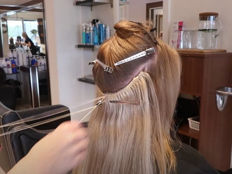Attaching weft hair extensions