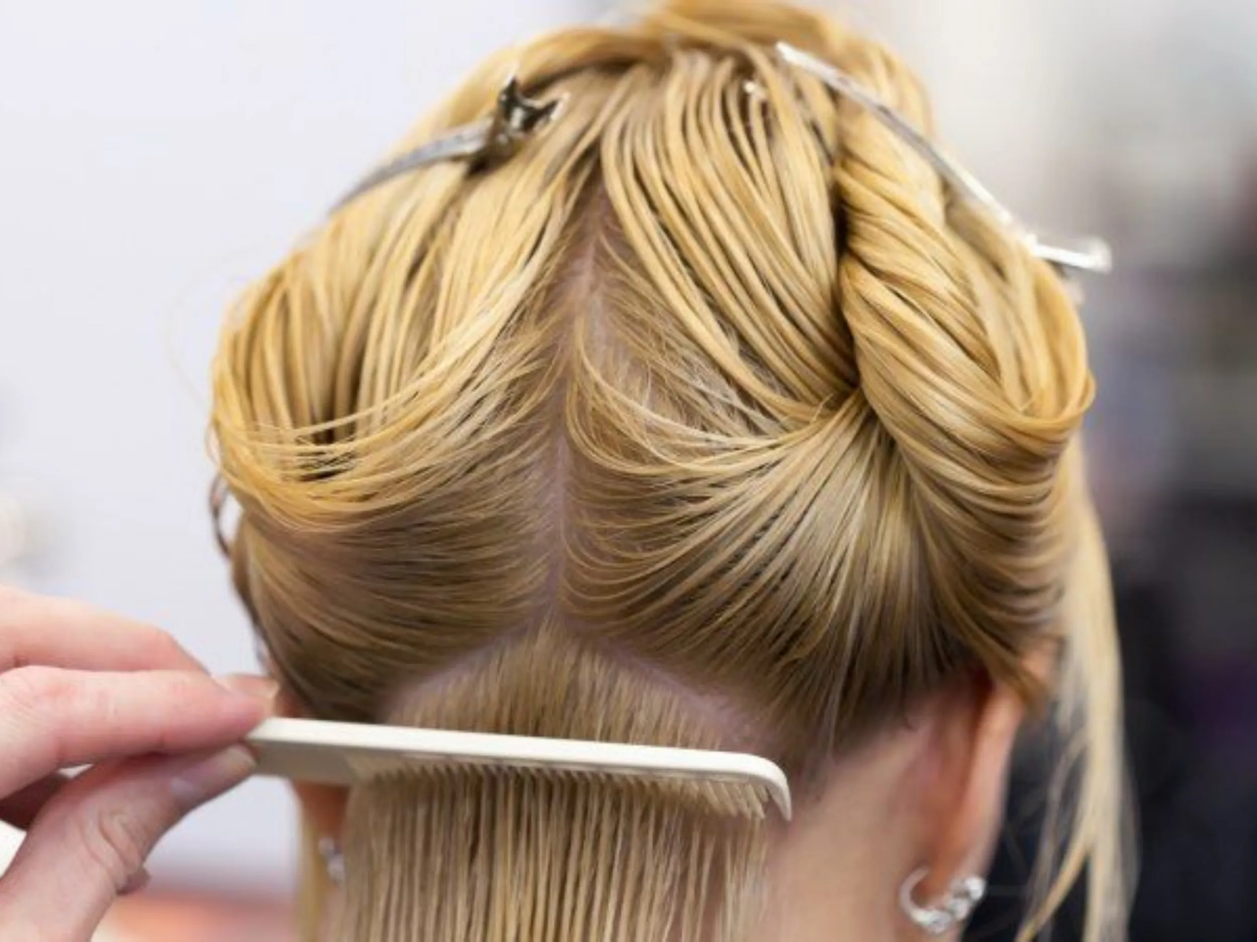 Test hydrogen peroxide on a hidden strand to monitor color change and prevent hair damage