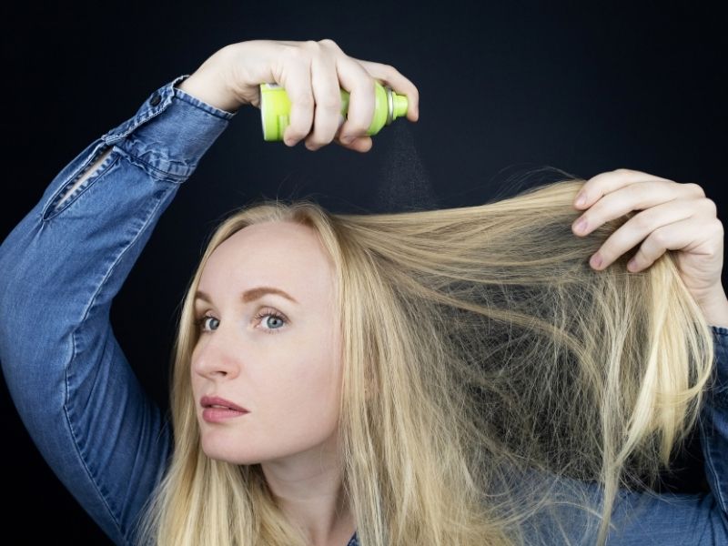 Spray your hair with a texturizing spray or a dry shampoo