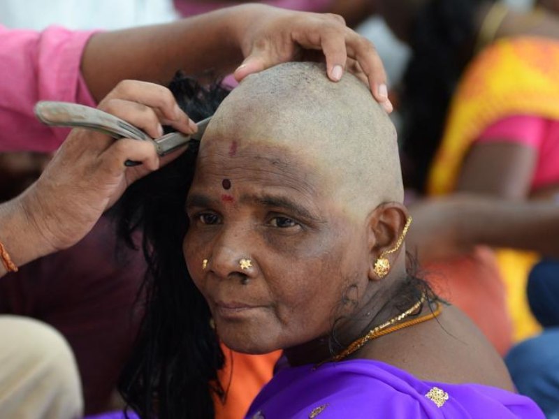 Indian has temple hair and hairballs - mixed from the floor or barbershops