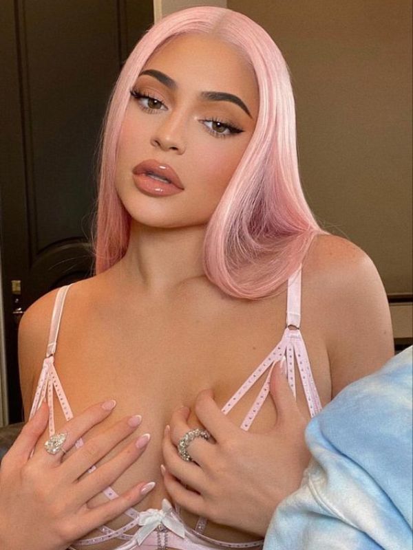 Kylie Jenner pink hair adds a trendy dimension to her overall aesthetic