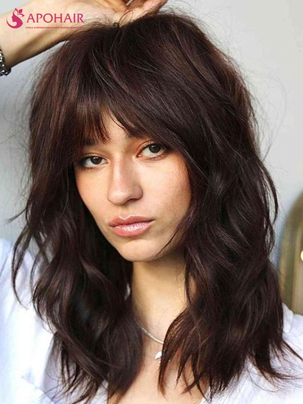 Textured Medium Shag with Wispy Bangs for high cheekbones girls