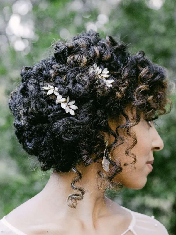 This simple addition transforms everyday curls into a more festive or formal look