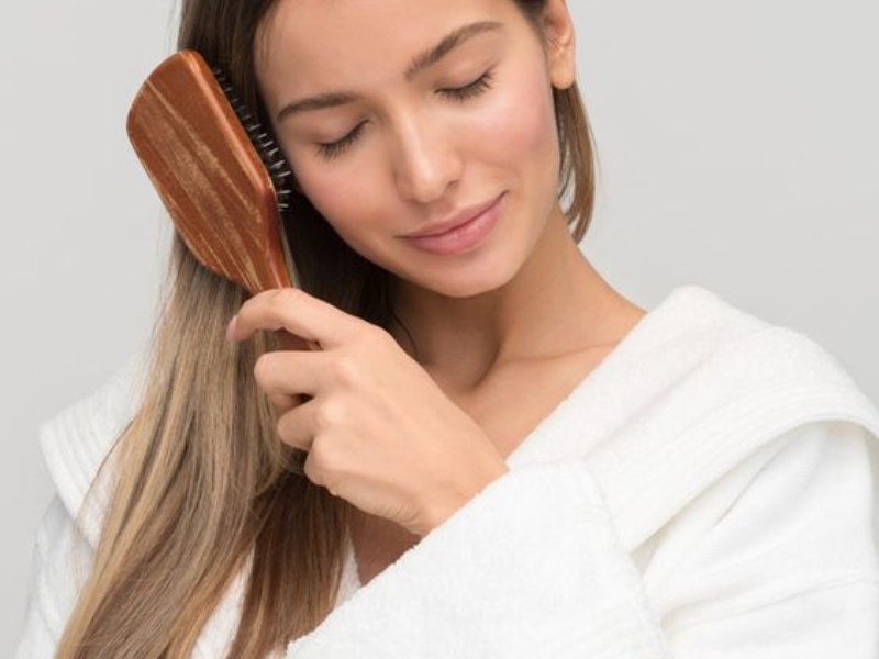 Use a soft-bristle brush to detangle your extensions and prevent breakage.