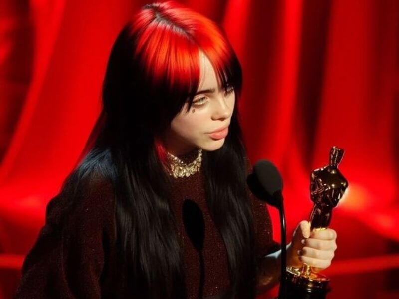 Billie Eilish hairstyles: Black hair with red accents