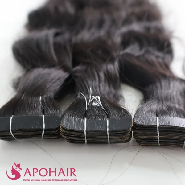 Black Natural Wavy normal tape in hair extensions view close up