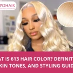Woman wearing 613 blonde body wave hair with light platinum shade and soft curls