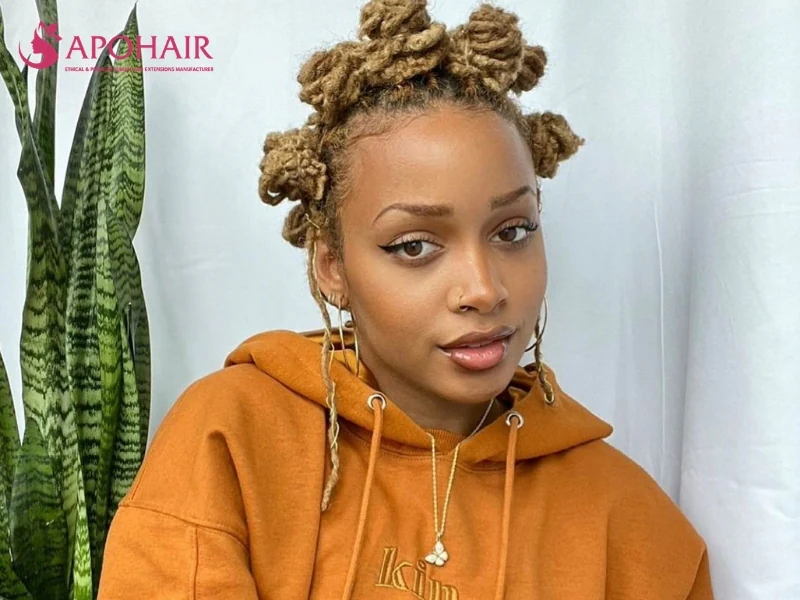 Bantu knots with locs coiled into textured, nubby knots