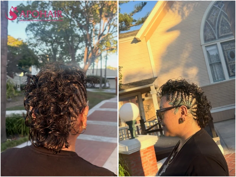 Cornrow mohawk with side rows braided back and curls left loose along the top