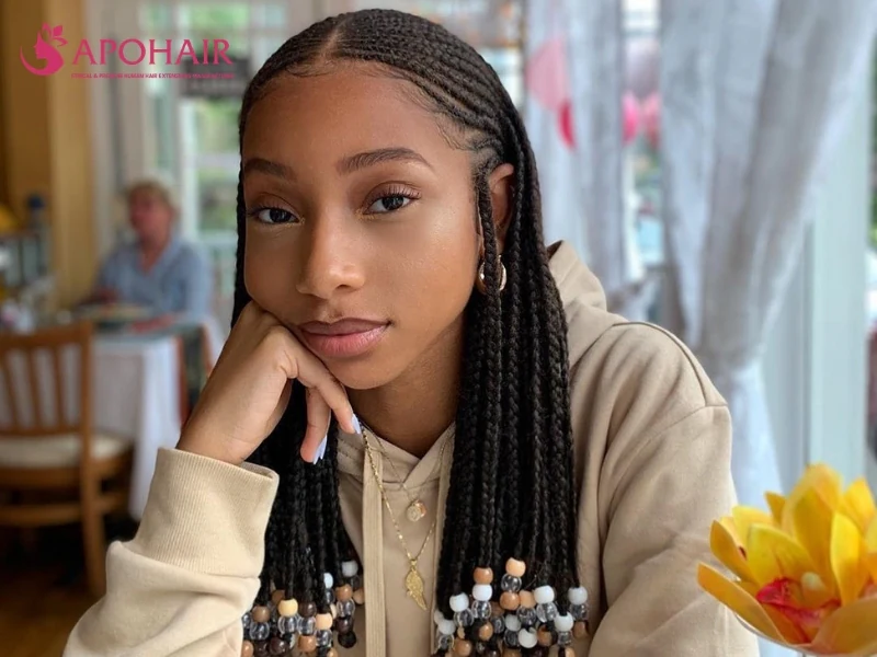 Fulani braids on natural hair with beaded ends at chin length
