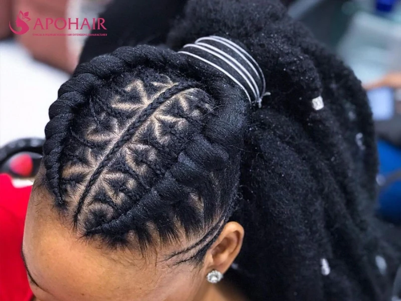 Kiko ponytail with threaded sections gathered into a high tail