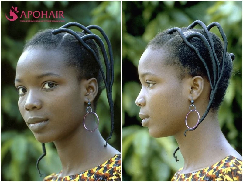 Traditional Yoruba irun kiko with thread-wrapped sections arched over the head