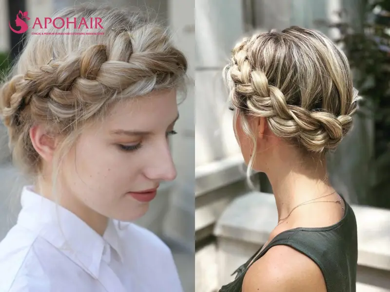 Two women wearing thick crown braids wrapped around the sides and back of the head