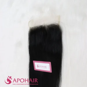 Close-up of a natural straight closure 5x5 showing the lace base, the parting area and the straight hair below
