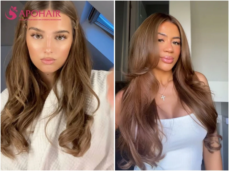 Two women with long honey brown waves in a golden-amber glow, on light and medium warm skin tones