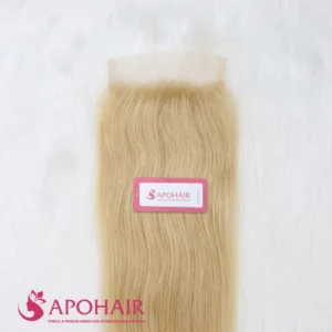 Close-up of a light blonde natural wavy closure 5x5 showing the lace base, the knots and the gentle wave below