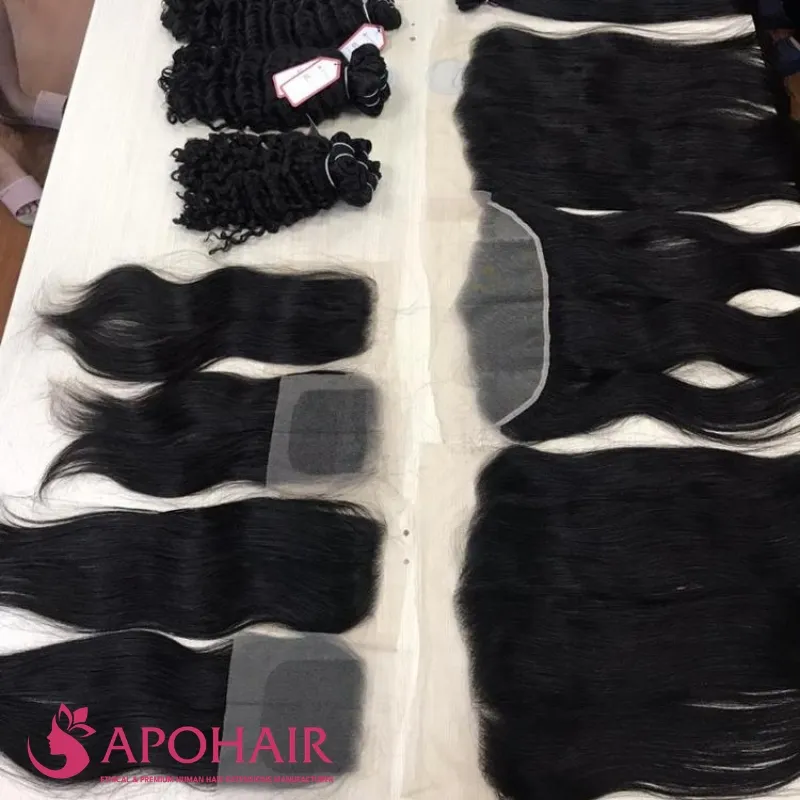 Natural black five by five lace closure and lace frontal with hair bundles displayed at Apohair