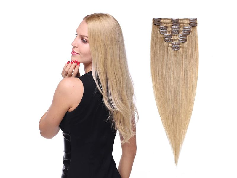 Clip in weft hair extensions